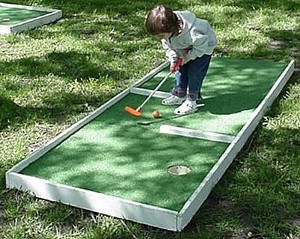 Little Girl Golfing